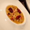Fregola sarda in brodo di gallina, polpa di granchio e datterino confit